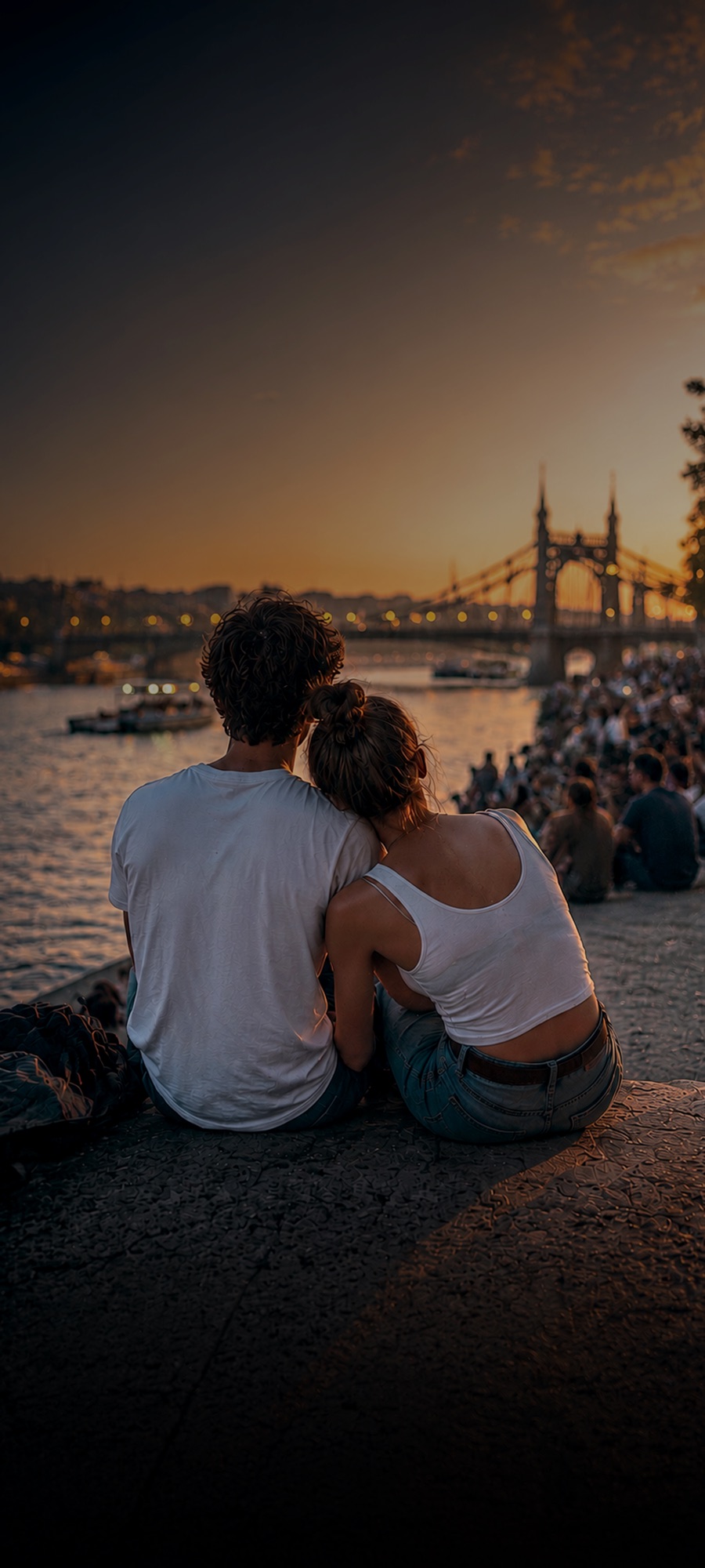 A couple remembering a moment by the river in Budapest
